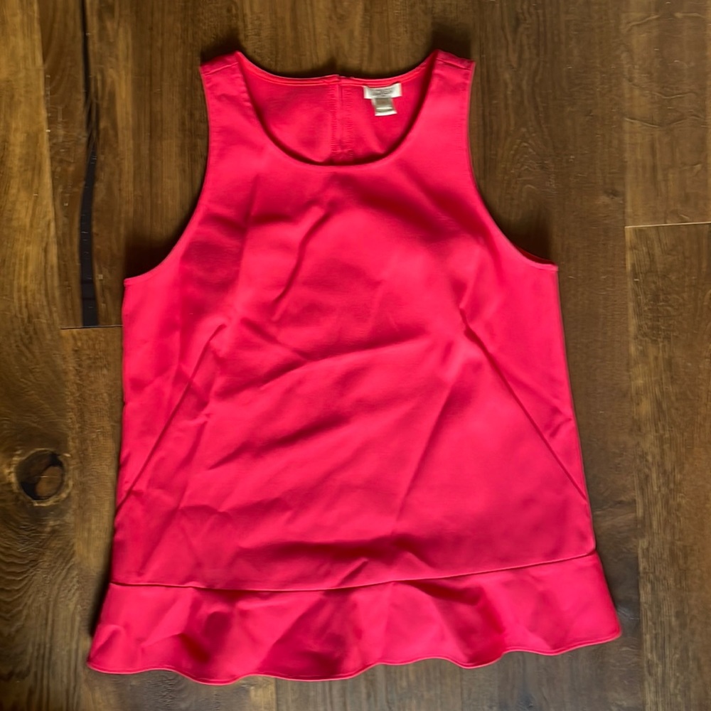 Hot pink sleeveless top with ruffle hem